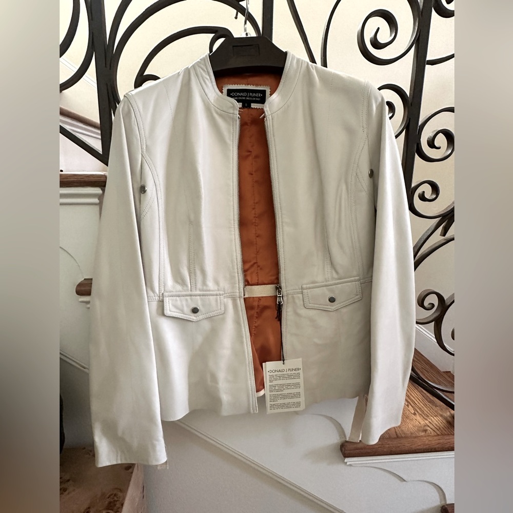 New never used leather jacket with orange lining from Donald Pliner.